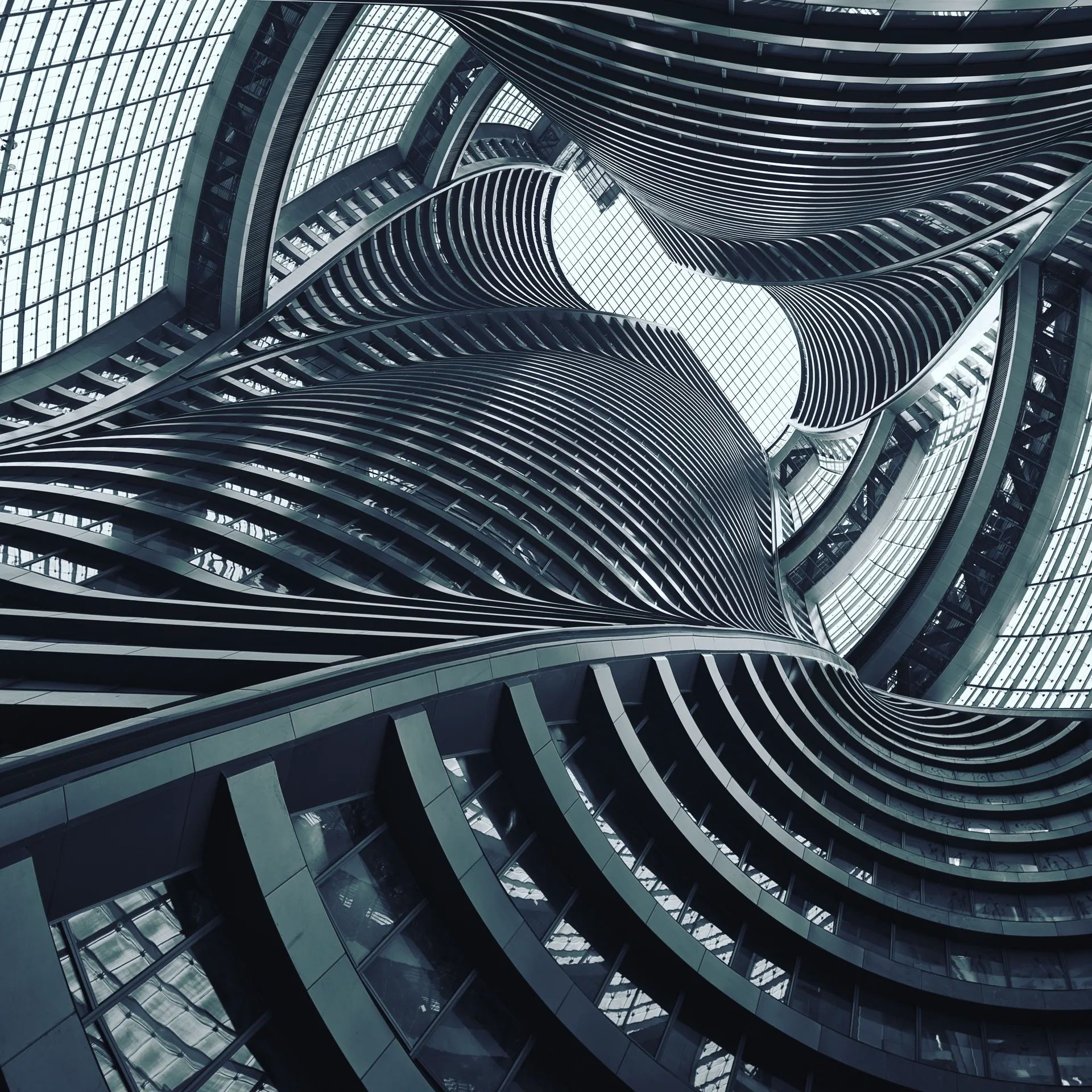 Spiralling architectural structure seen from within